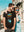 t-shirt-mockup-of-a-man-with-sunglasses-hanging-out-with-his-girlfriend-m1938-r-el2